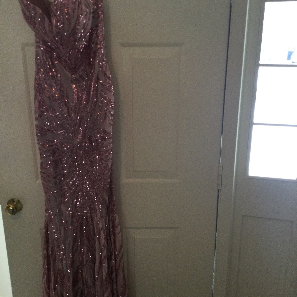 Strapless pink sequin dress with mesh overlay. It is a size 2 by Portia&Scarltt